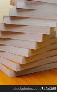 Stack of book in office desktop. Close up paper&rsquo;s pages.
