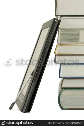 Stack of books and electronic book reader on the white background