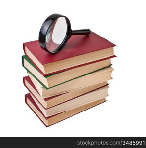 stack of books and magnifying glass isolated on white