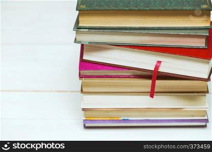 stack of books on a white background, closeup
