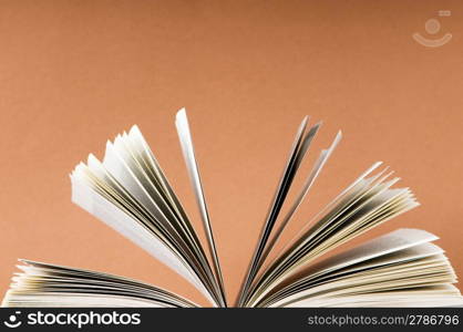 Stack of books on the color background