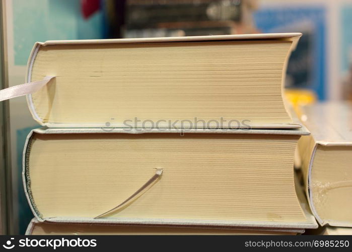 Stack of books stored as Education and business concept