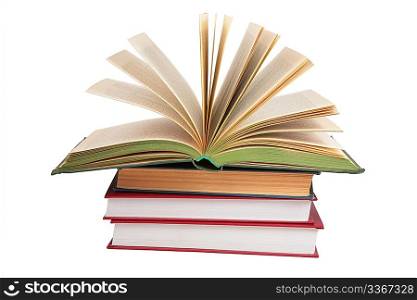 Stack of books with opened book