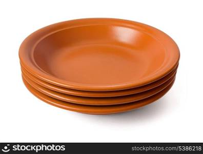 Stack of brown ceramic plates isolated on white