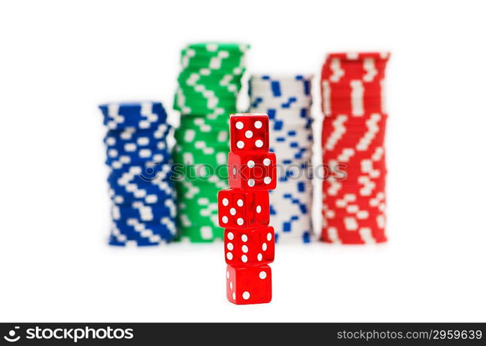 Stack of chips and dice isolated on the white background