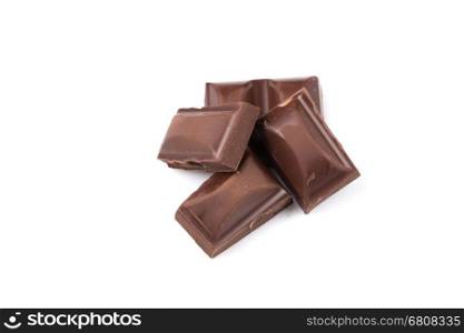 Stack of chocolate pieces on a white backgroun and isolated