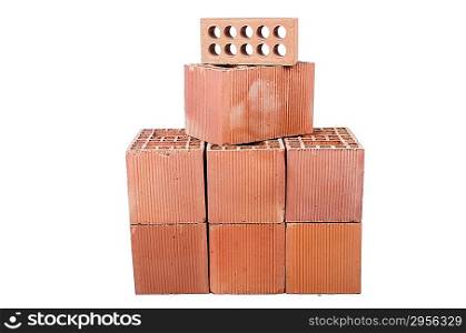 Stack of clay bricks isolated on white