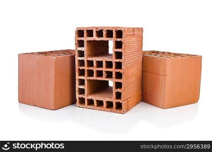 Stack of clay bricks isolated on white