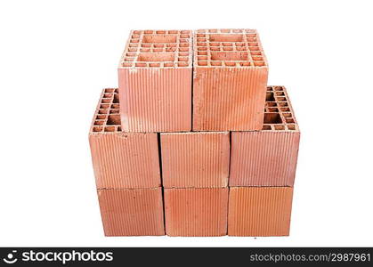 Stack of clay bricks isolated on white