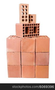 Stack of clay bricks isolated on white