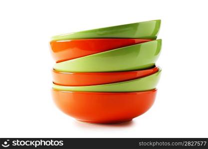 stack of clean empty plates isolated on white background