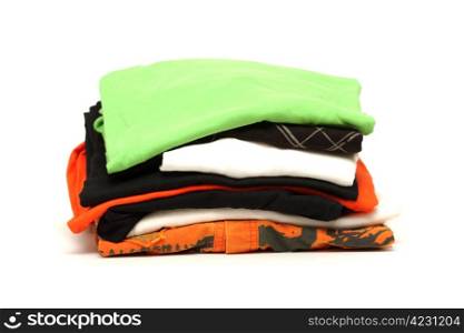 Stack of clothes isolated on white background.