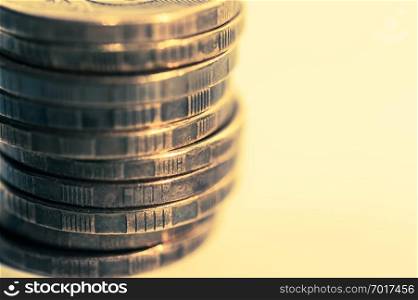 Stack of coins macro. Rows of coins for finance and banking concept. Economy trends background for business idea and all art work design. Closeup, Shallow depth of field. Toned.. Stack of coins macro. Rows of coins for finance and banking concept. Economy trends background for business idea.