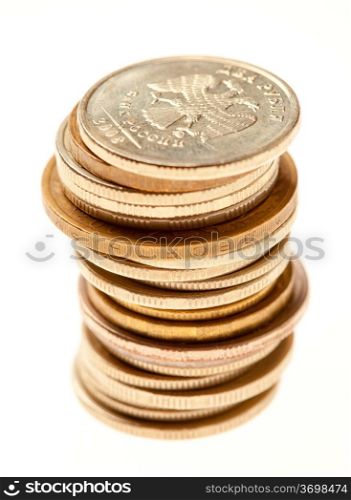 Stack of coins on a light gray background