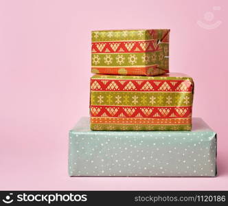 stack of colored paper wrapped gift boxes. Beautiful box gift, great design for any purposes.