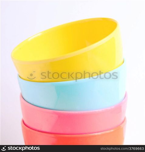 Stack of colorful plastic bowl with retro filter effect