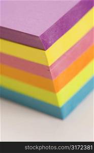 Stack of colorful sticky notes.