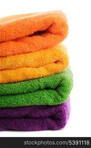 Stack of colorfull towels isolated on white