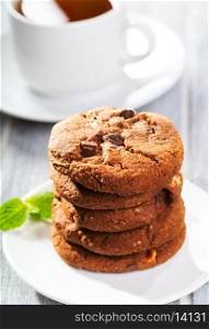stack of cookies and cup of tea