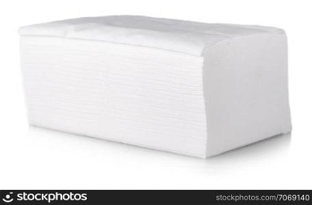 Stack of folded disposable tissue papers on white background
