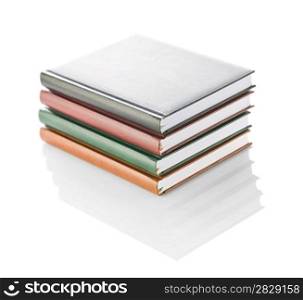 stack of four diaries isolated