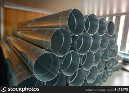 Stack of Galvanized steel Drainpipe in warehouse