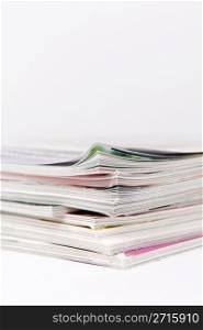 Stack of glossy periodical magazines
