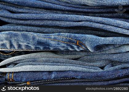 Stack of jeans paints