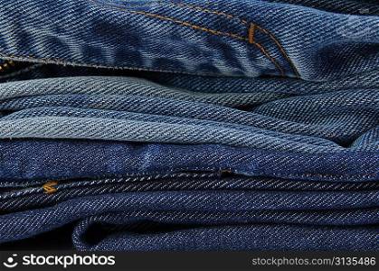 Stack of jeans paints