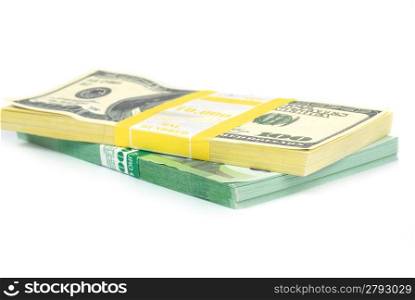Stack of money- cash of US dollars and euros isolated on white background