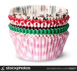 Stack of multicolored paper cups for baking muffins isolated on white background