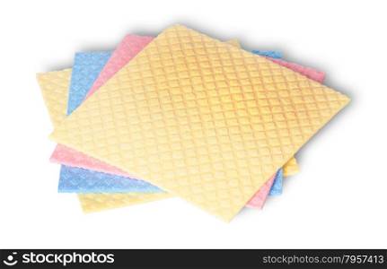 Stack of multicolored sponges for dishwashing isolated on white background