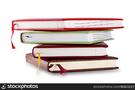 Stack of notebooks with bookmarks isolated on white background. Stack of notebooks with bookmarks