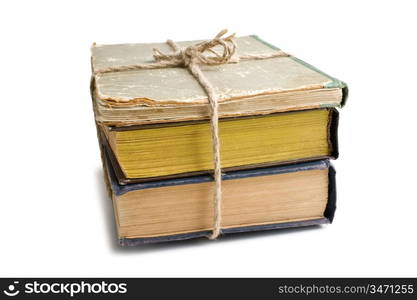 stack of old books tied with rope isolated on white