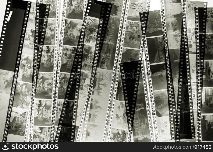 Stack of old films on the light background.
