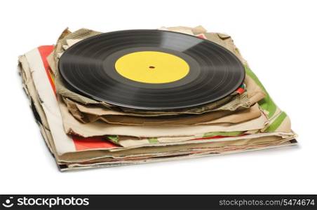 Stack of old vinyl records isolated on white