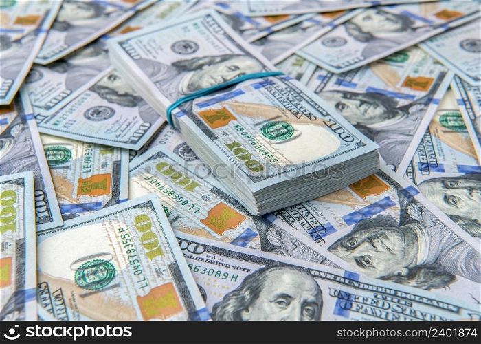 Stack of one hundred dollar bills close-up.