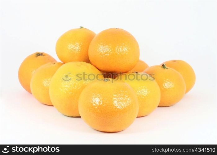 Stack of oranges isolated on white