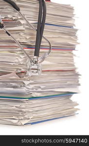 Stack of papers with stethoscope