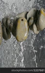 Stack of pebbles in water
