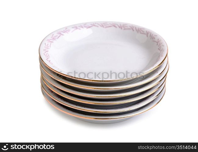 stack of porcelain plates isolated on a white background