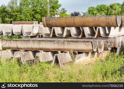 Stack of prefabricated concrete for the construction of irrigation channels for agriculture.