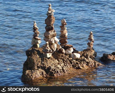 Stack of round stones on a seashore