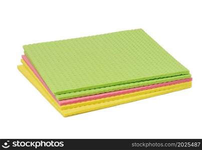 stack of rubber sponges for washing dishes and cleaning the house on a white background
