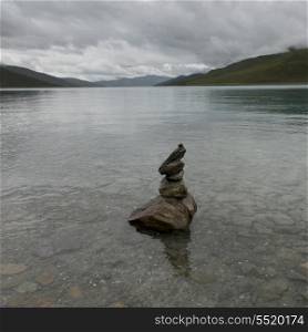 Stack of stones in the Yamdrok Lake, Nagarze, Shannan, Tibet, China