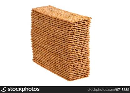 stack of thin crispbreads isolated on white