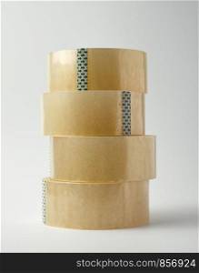stack of transparent adhesive tape on a white background, close up
