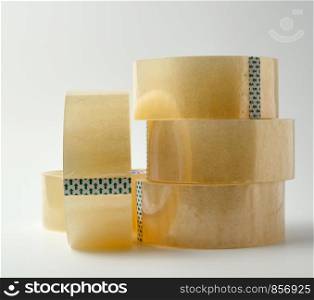 stack of transparent adhesive tape on a white background, close up
