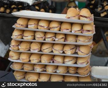 Stack of Trays with Fresh Sandwich filled with Italian Ham