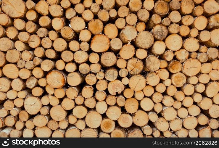 Stack of tree trunks. Texture background wallpaper. Stack of tree trunks. Texture background